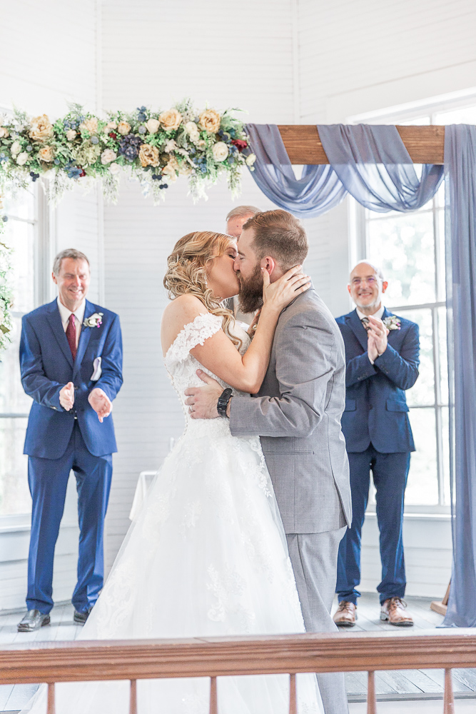 Mississippi Wedding Photographer | Bride and groom portrait | first kiss