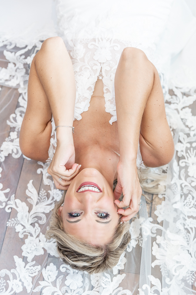 Annie Elise Photography | White House Hotel | Bridal Portrait | Bride laying down