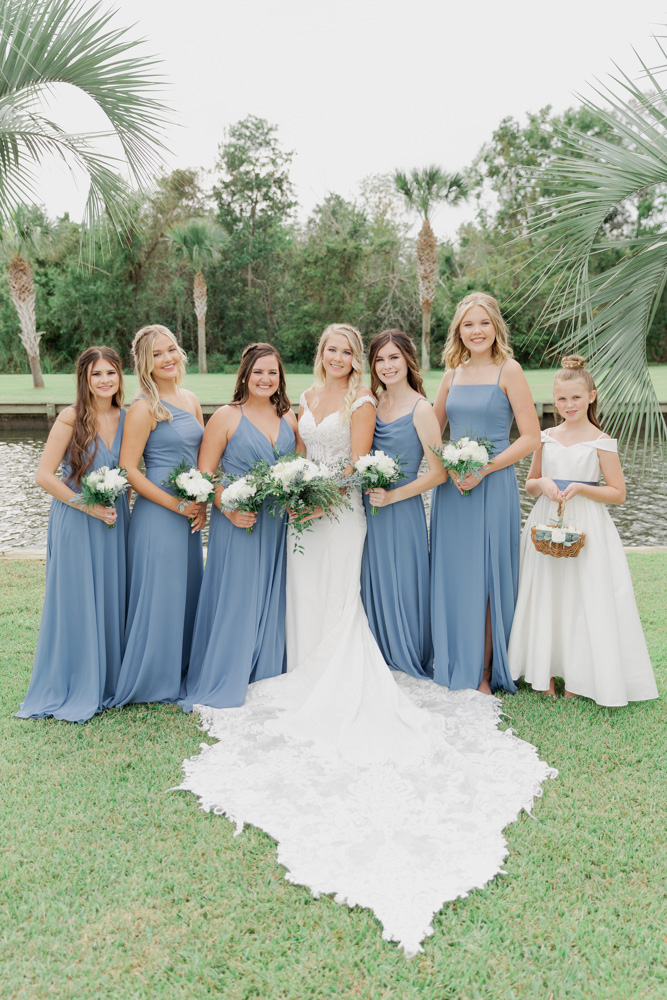 Annie Elise Photography | Dusty Blue Bridesmaid Dresses | Lakeside wedding | White flower bouquet