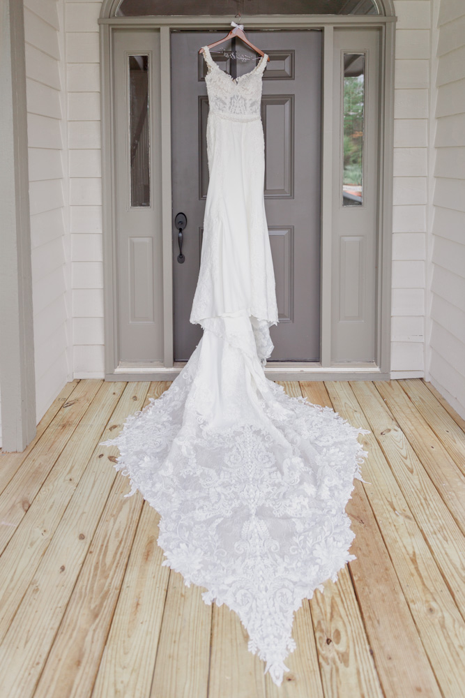 The bridal vault | Hanging dress on door